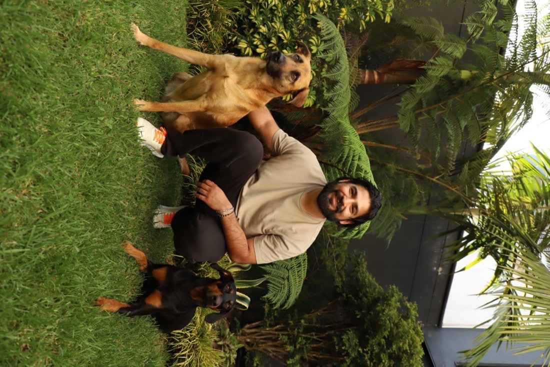 David Arango, the photographer behind Solera, with his two dogs